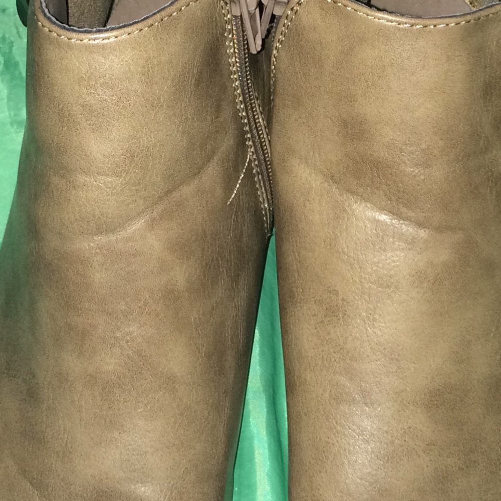 Wedge heeled dressy boots.